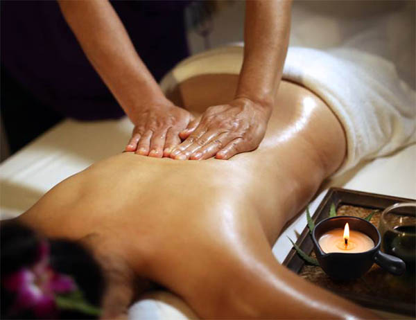 Warm herbal compress treatment at Amla Spa